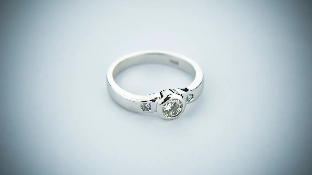 bezel set diamond engagement ring